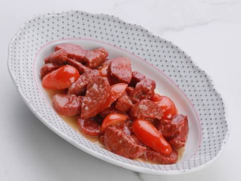 Spicy Sausages with Tomatoes